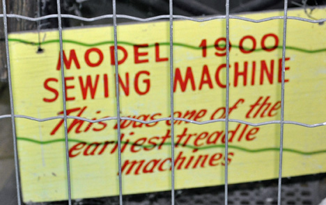 1900 sewing machine sign
